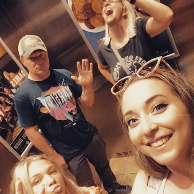 Crazy family picture on vacation in an elevator